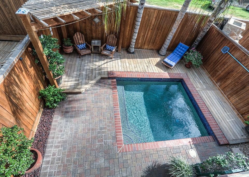 Live in town with a pool! This backyard is amazing.