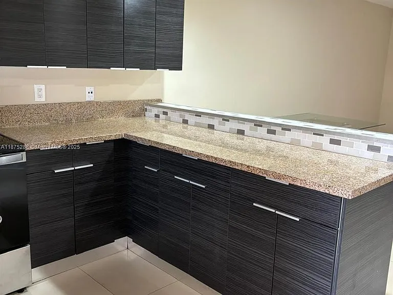 5650 W 26th Ct — Photo 1
