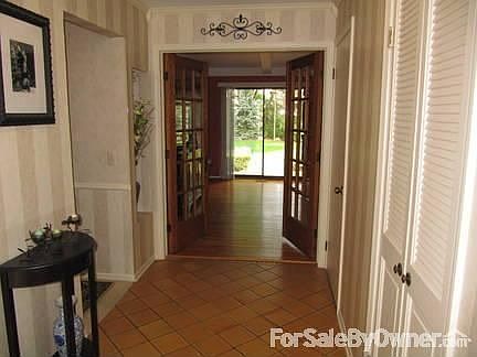Foyer
						:
						Looking through French door, into Great Room, onto deck