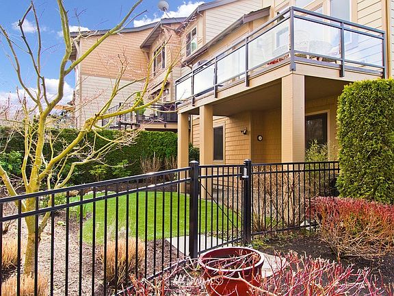 Classic wrought-iron fence with gated code