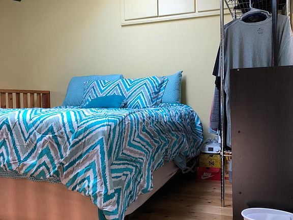 The loft fits a queen size bed and a dresser. There is stor