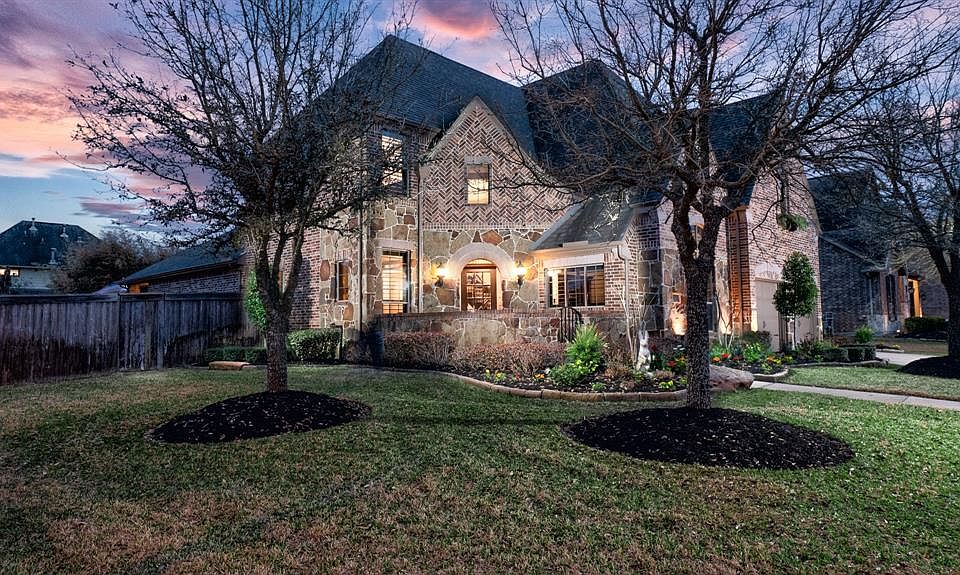This hidden treasure of a home just exudes warmth and welcome in the twilight hours! Let's take a tour...