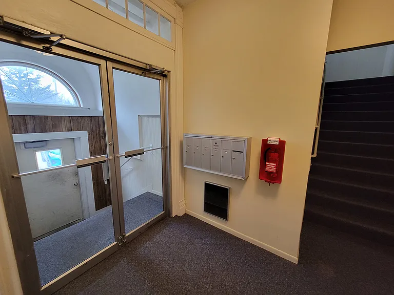 Main door has 5 steps up to lobby, steps are not very tall