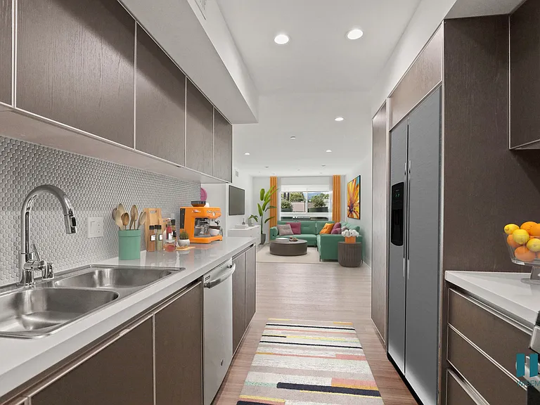 Full-Size Kitchen with Ample Cabinet Storage and Energy-Efficient Appliances