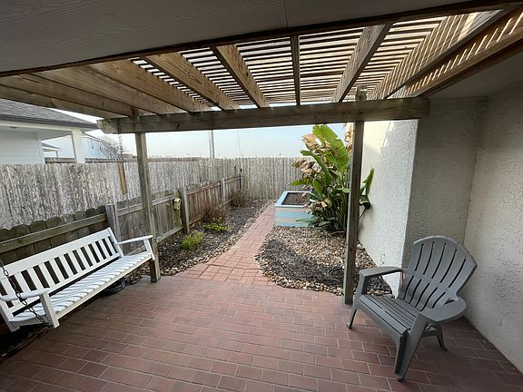Private yard with garden bed