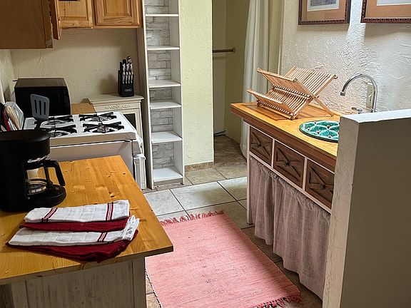 Beautiful Talavera sink under a skylight.