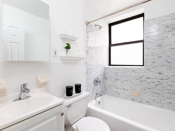 4th image of 414 E 10th St APT 3C