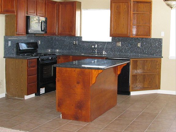 Granite with Black appliances
