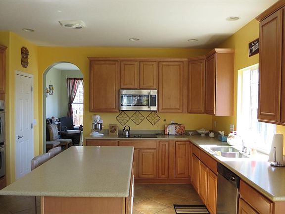 Stainless Steel Appliances, Lots of Cupboard and Counter Space w/Center Island