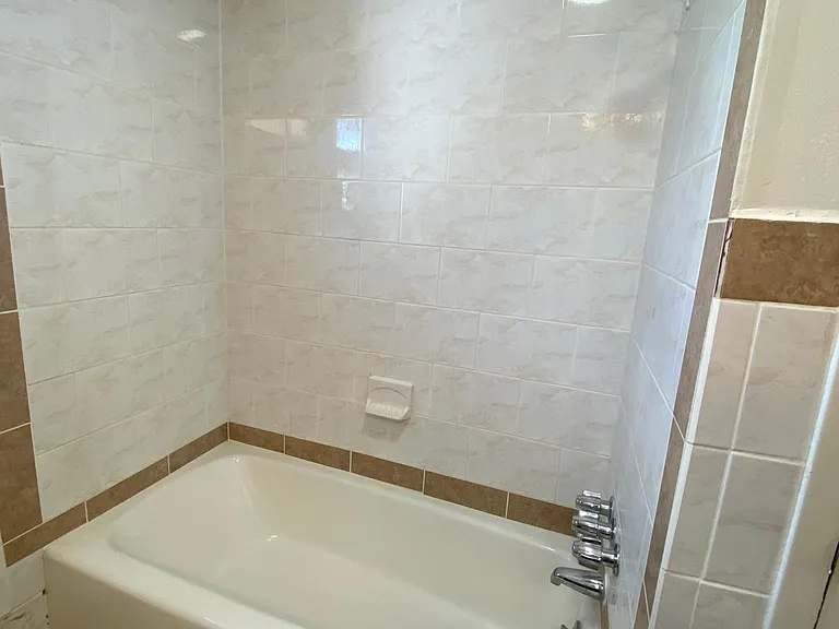 Bathroom is all tile!
