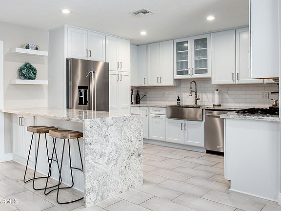 3rd image of 8408 E LEWIS Avenue
