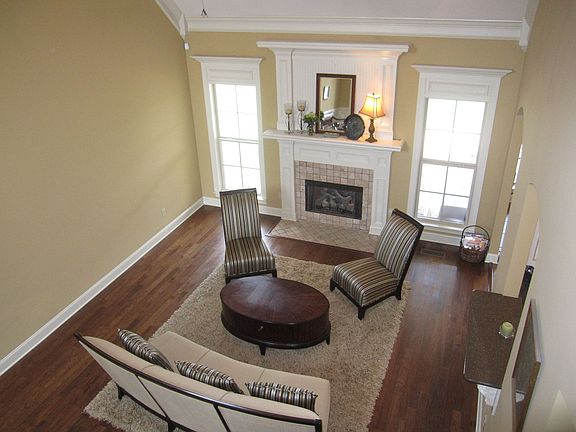 Formal Living with gas fireplace and hardwood floors