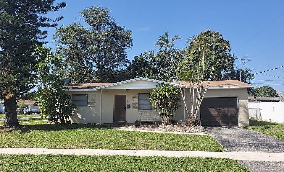 Front View with one car garage