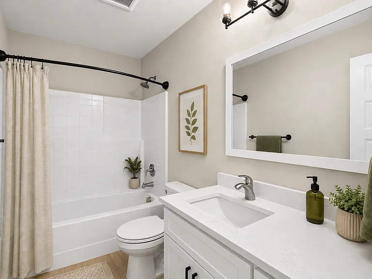 Bright and modern bathroom featuring sleek finishes, ample vanity space, and contemporary design details. Bright and modern bathroom featuring sleek finishes, ample vanity space, and contemporary design details.