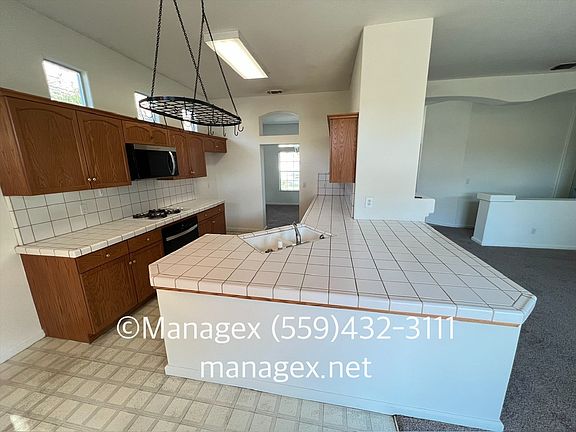 4th image of 5455 W Bedford Ave