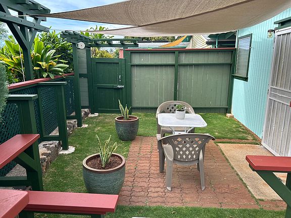 Private lanai just for you. This is a great place to begin your day with coffee and end your day with wine under the stars.

Landscaping is included.