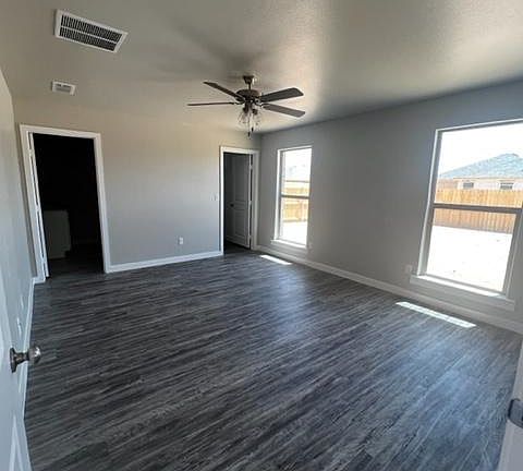 Primary bedroom with ensuite bath and large closet