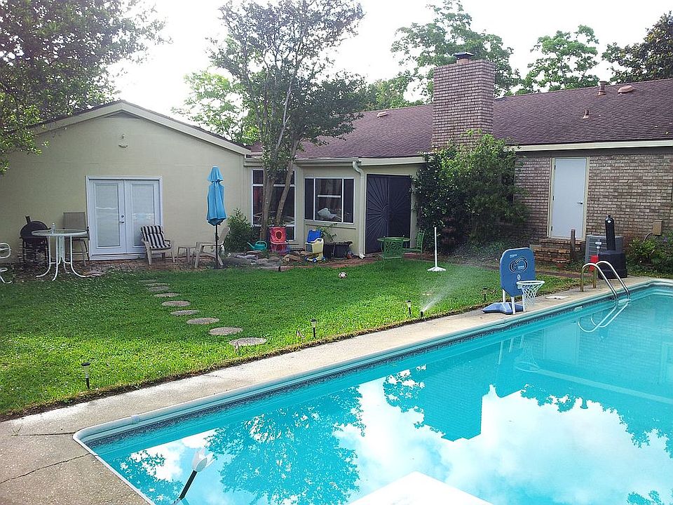 huge backyard with 8 foot deep pool