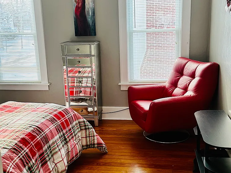 Spacious bedroom known as the red room