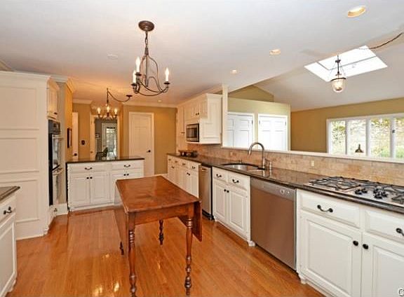 Spacious with double ovens and removable center island (pictured