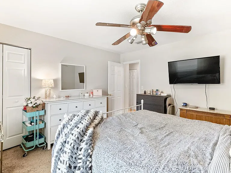 Primary Bedroom *NOTE: floors have been updated with new laminate flooring, not pictured*