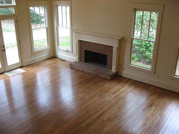 Kitchen opens to large family room w/ vaulted ceiling 