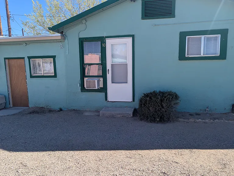Main door on the right leads into the living room/entry way. The door in the left is to the great room/bonus room.