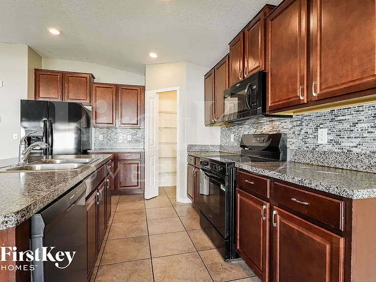 14144 Covert Green Pl — Photo 10