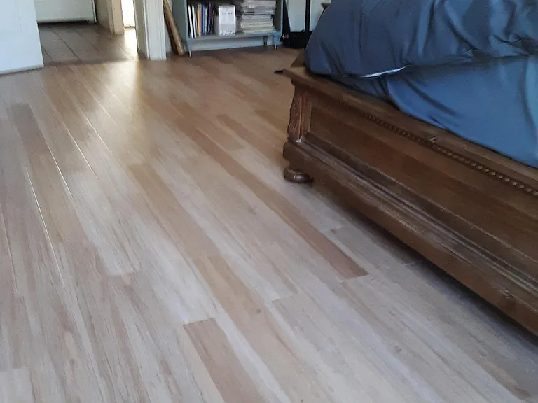 Large Bedroom - looking toward entrance to kitchen - bathroom on right