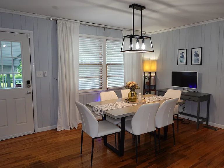 Dinning room with backdoor to carport and deck shown here.