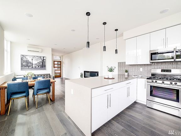 Another angle of the kitchen with gas stove.