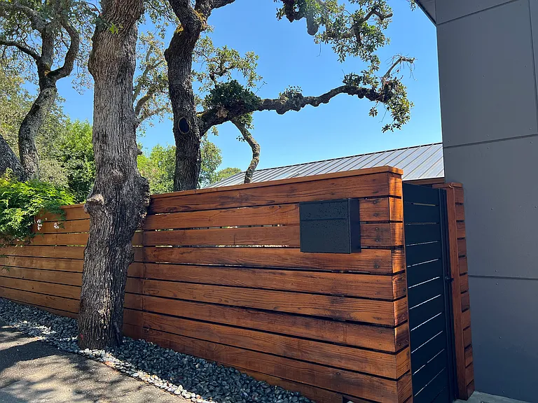 View from road of garden and front door entry