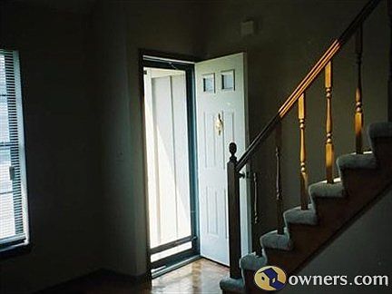 view to front door and stairway