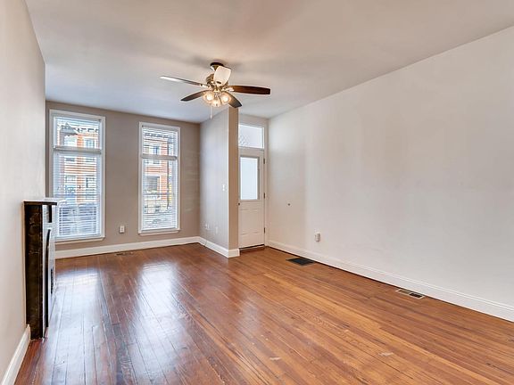 Huge living room with tall windows!