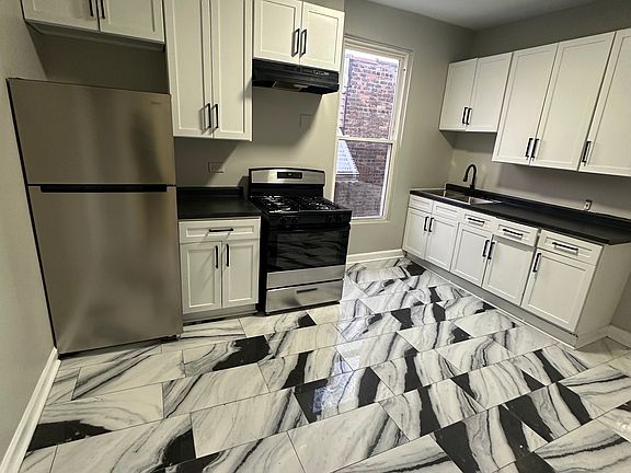 2nd image of 6707 S Langley Ave #2
