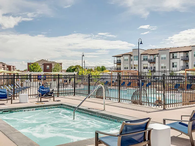 Enjoy a relaxing escape just steps from home with a soothing spa retreat surrounded by poolside seating, modern amenities, and beautifully designed outdoor spaces.