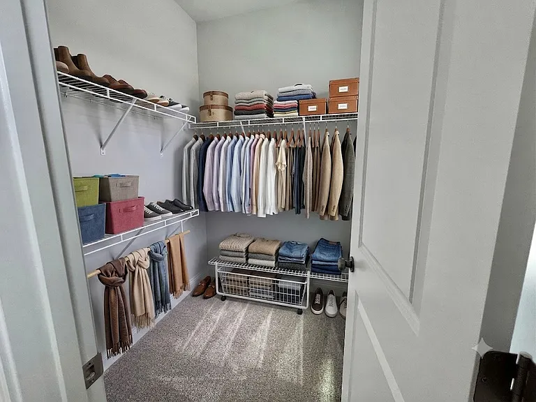 Bedroom 2 walk-In Closet with window-Upstairs -Virtually Staged