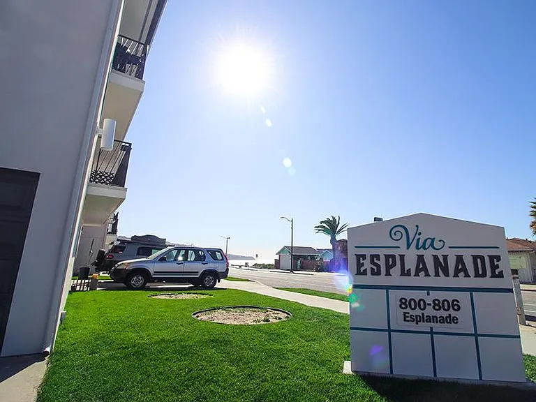 Via Esplanade Apartments Redondo Beach Exterior Sign and Grass Area