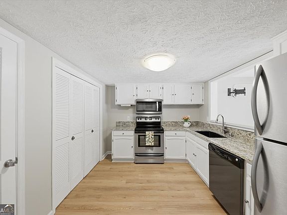 5th image of 7750 Roswell Rd Unit 9F