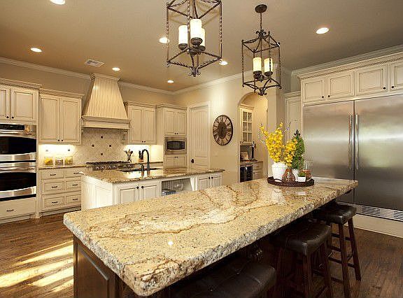 Oversized side-by-side refrigerator.