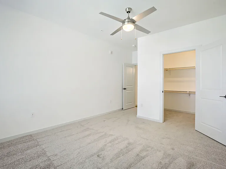 Walk-in closets with built-in shelving keep you organized and clutter-free. Garrett Harvest Junction West _ new apartments in Longmont, CO.