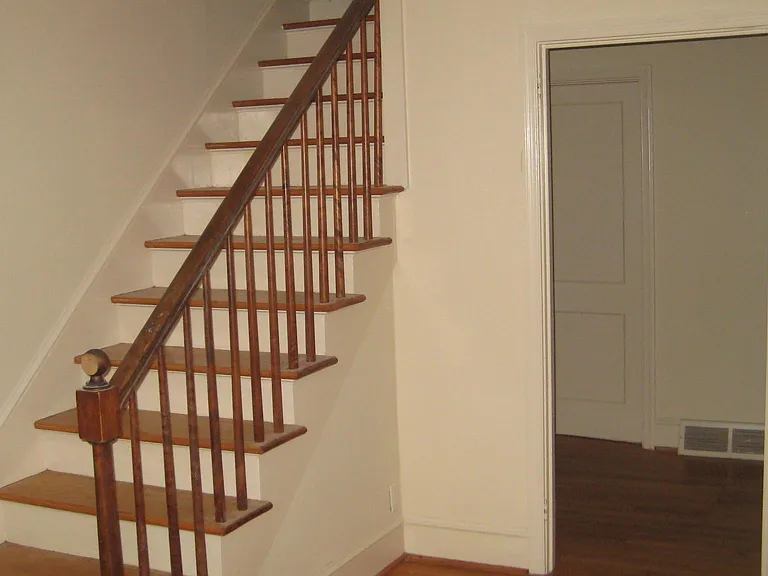 Unique staircase book shelf.