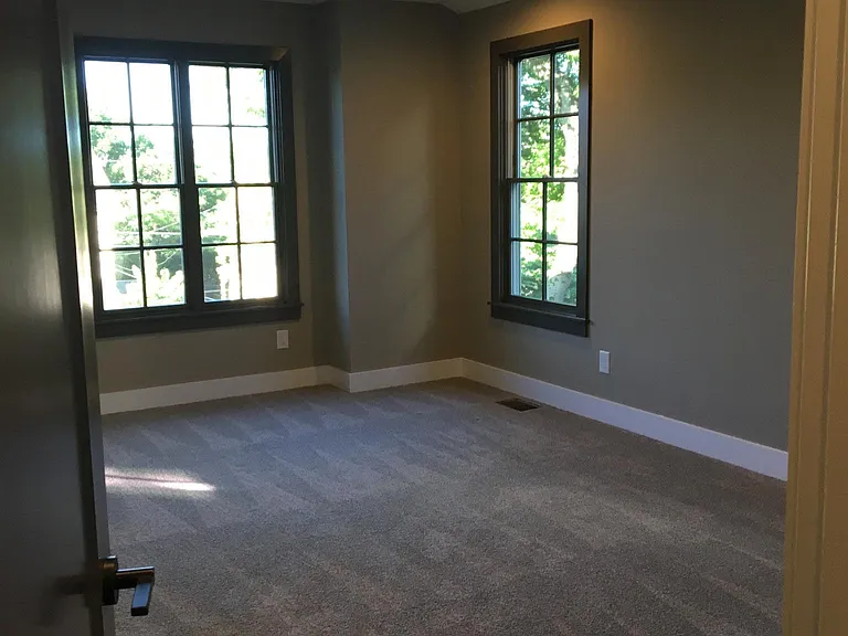 Upstairs primary bedroom with walk in closet.