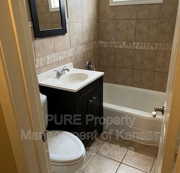 429 E 63rd Ter — Photo 14
