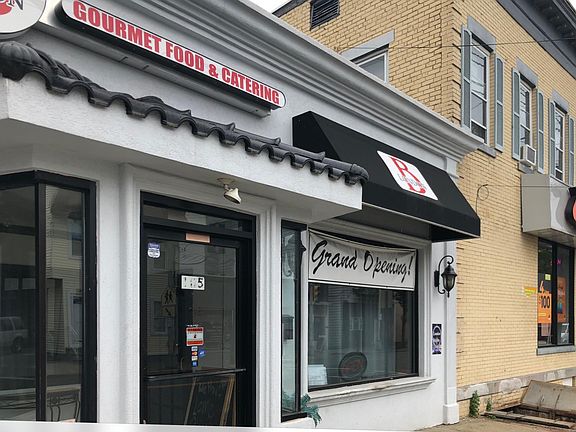Below the groundnut B-London restaurant and caterers, and Boost Mobile