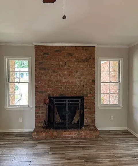 Family Room wood burning fire place with gas starter