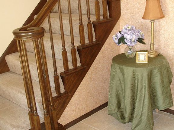 into a tiled foyer to the living and familiy room spaces