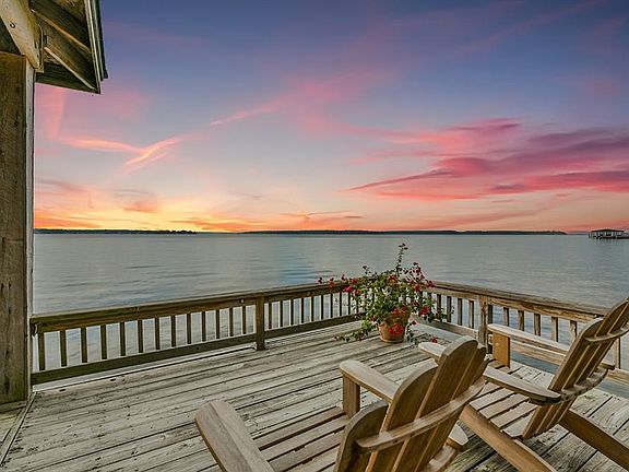 The extended decking off of the boat dock. The views are breathtaking. Imagine the amount of different sunsets this spot has seen.