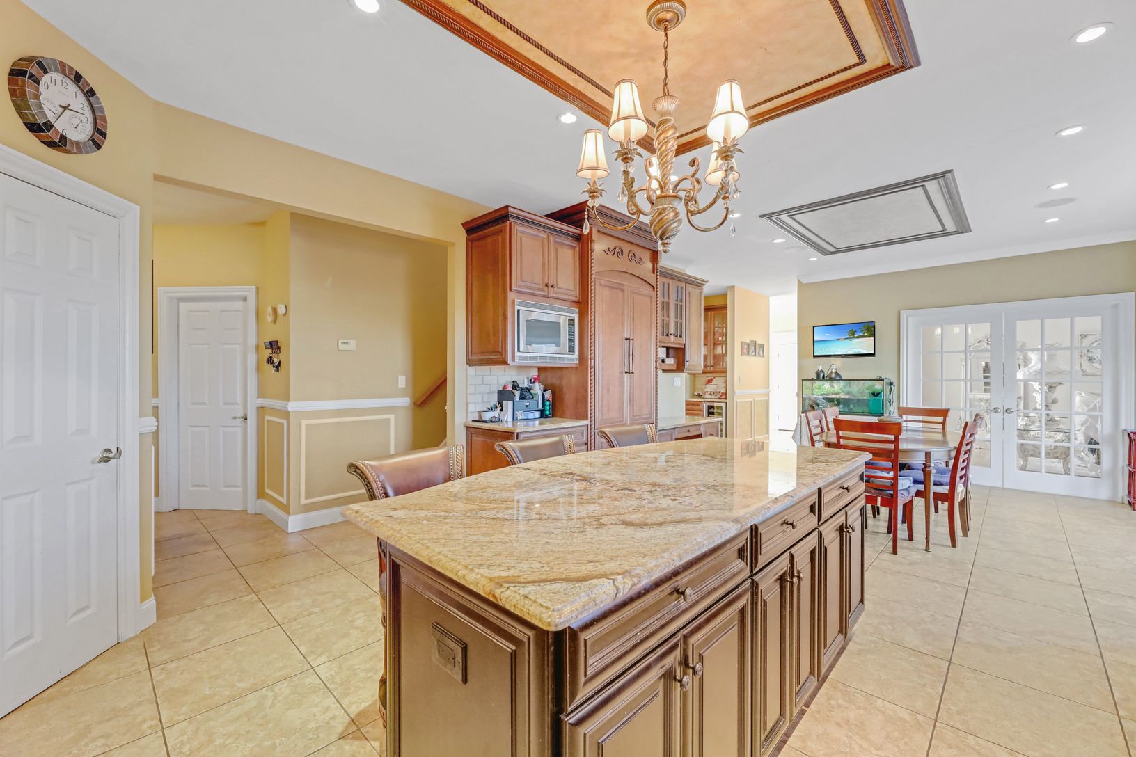  Chef's Kitchen with Service Stairwell to Second Level
