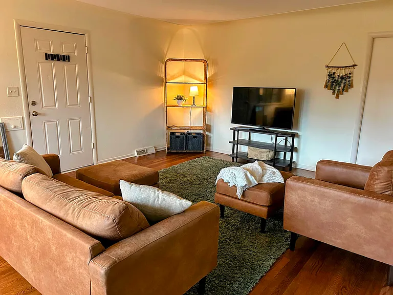 Currently furnished, wood floors and natural lighting throughout